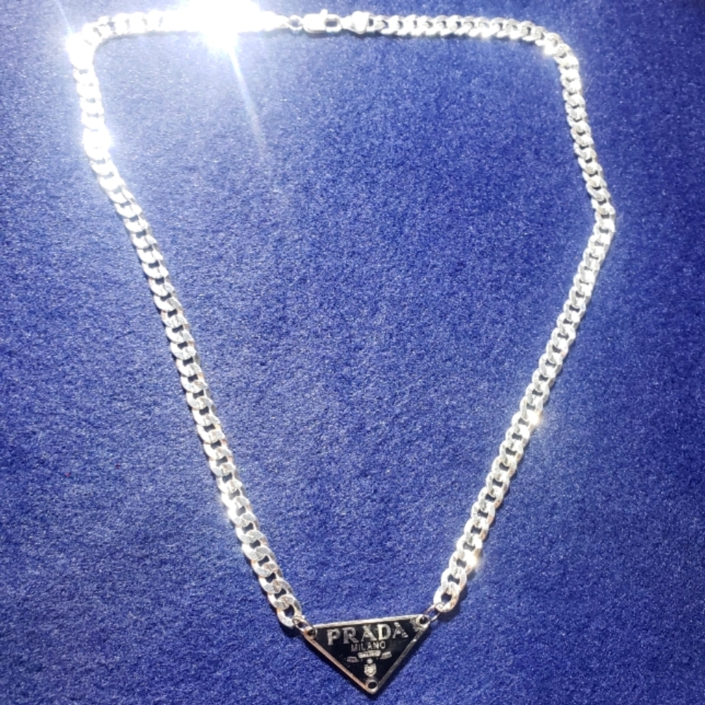 Sterling silver prada chain.
